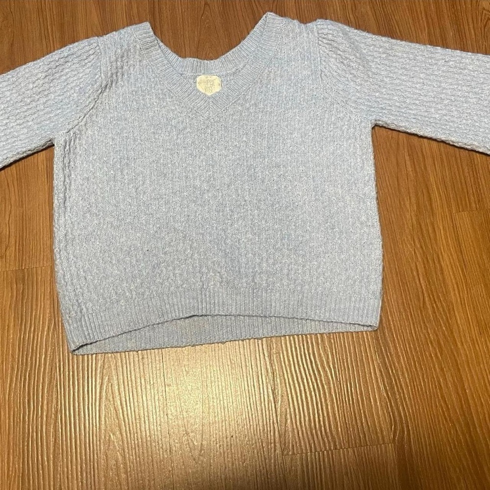 Blue Sweater with Knitted Texture.